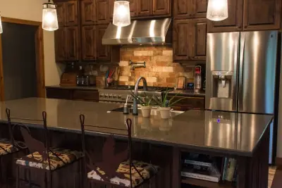 Rustic Lodge Style Kitchen in the Meadows Home — Home Renovation & Remodeling Services project by Robbins Construction