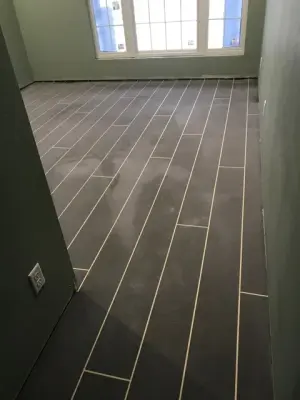 Concrete with a Rustic Wood Floor Appearance by Radlund Construction LLC