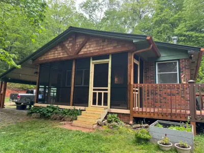 Cedar-Accented Gable Screened Porch Expansion — Home Renovation & Remodeling Services project by Big League Builders And Remodelers