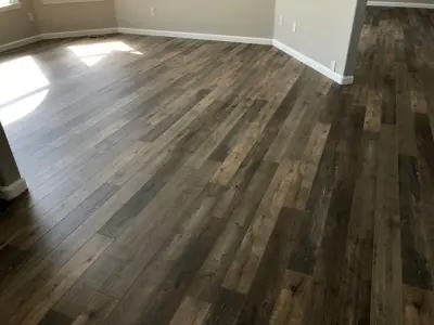 Seamless Laminate Flooring Installation — Home Renovation & Remodeling Services project by Phoenix Remodeling LLC