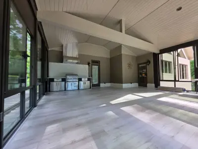 Upper-level sunroom with outdoor cooking area — Home Renovation & Remodeling Services project by Grand Outdoor Living Design
