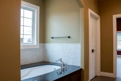 Slocum Custom Home - Main and Powder Bathroom — Home Renovation & Remodeling Services project by Robbins Construction