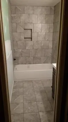 Malone Bathroom Renovation — Home Renovation & Remodeling Services project by Strickland Painting And Construction