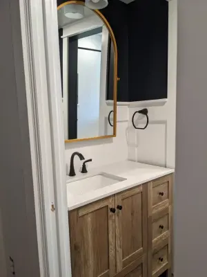 Compact Restrooms — Home Renovation & Remodeling Services project by Distinctive Homes, LLC