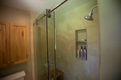 Midland, MI Stacked Stone Luxury Bathroom — Home Renovation & Remodeling Services project by Griggs Building & Design Group