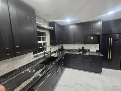 Elegant Dark Kitchen — Home Renovation & Remodeling Services project by Level Up Construction & Investment Group LLC