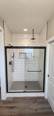 Bathroom with Subway Tiles — Home Renovation & Remodeling Services project by JAC Construction LLC