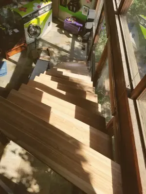Elegant Open Staircase Design and Construction | Tapered and Fanning Styles — Home Renovation & Remodeling Services project by V-Builders