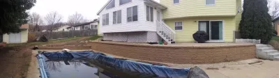 Backyard Pool Retaining Wall — Landscape Construction project by Majestic Services Of Michigan