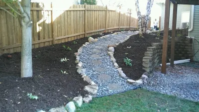 Landscape Design "Hosta Garden Walkway" by Mark's Lawn Service, Inc.