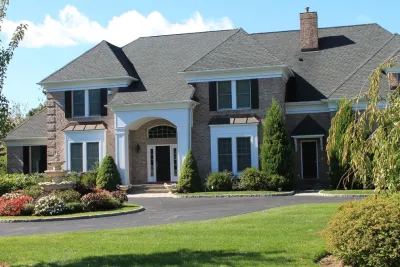Driveway & Front Lawn by Martino Landscape Contractors Inc