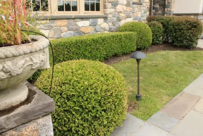 Traditional Landscape & Entrance by Martino Landscape Contractors Inc