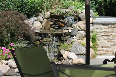 Outdoor Kitchen & Water Feature — Landscape Construction project by Martino Landscape Contractors Inc