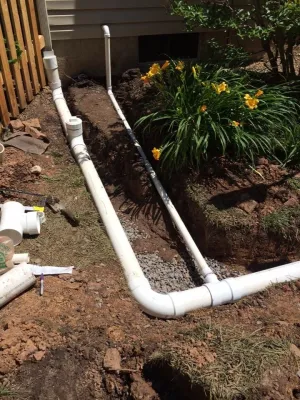 Buried Downspouts and Sump Pump — Landscape Construction project by Mason's Landscaping And Construction LLC