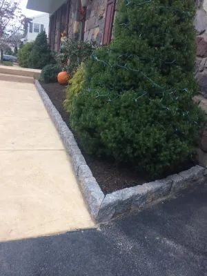 EP Henry Edge Stones in Dakota Blend — Landscape Construction project by Mason's Landscaping And Construction LLC