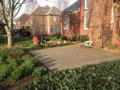 Flagstone Patio, Outdoor Kitchen, & Outdoor Fireplace — Landscape Construction project by Master's Landscape Design