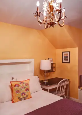 Vibrant Retro Bedroom by A. Klein Interior Design LLC