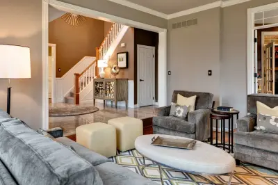 Elegant and Comfortable Living and Family Space by Staging Spaces And Design