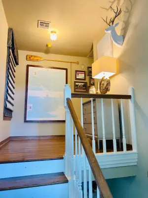 Landing at the staircase — Interior Design & Decorating project by Melanie Leeds Design