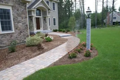 Tan Brick Pathway by Michael Therrien Landscaping, LLC