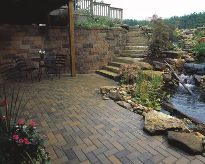 Retaing Wall Installation 2 — Landscape Construction project by Mike's Clean Cut Landscaping, Inc
