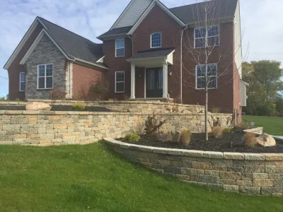 Retaining Wall Installation — Landscape Construction project by Mike's Clean Cut Landscaping, Inc