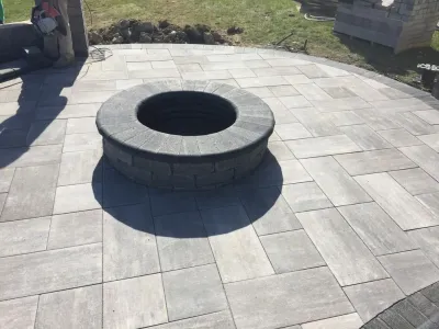 Fire Pit Patio Space by Mike's Clean Cut Landscaping, Inc