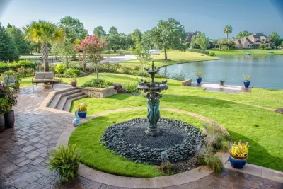 Lakeside Terraced Backyard by Mirror Lake Designs