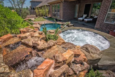 Courtyard Pool and Spa by Mirror Lake Designs