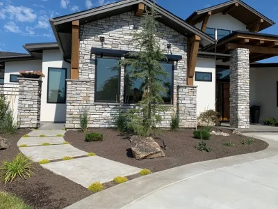 Outdoor Kitchen and Water Feature by Modern Landscape