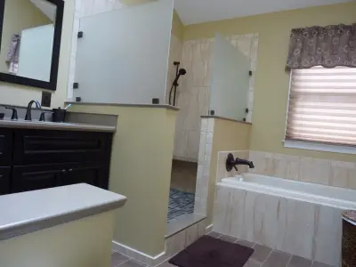 Tiled Bath with Walk-In Shower by Mattioni, Inc