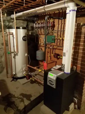 High Efficiency Boiler with Indirect Water Heater in Waltham, MA — Plumbing Services project by Mike Richard Plumbing & Heating Services