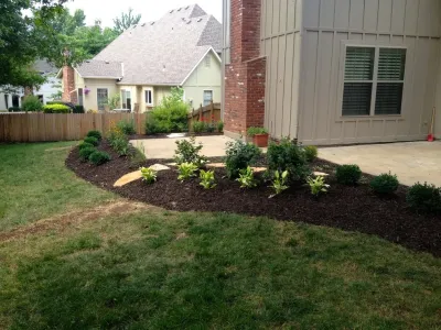 Leawood Backyard by Monumental Lawn & Outdoor LLC