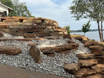 Boulder Wall — Landscape Construction project by Nature One Landscape Design