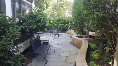 Serpetine Sitting Wall and Water Feature. Bluestone Patio Installation Lenox, MA — Landscape Construction project by Nature Works Land Care Inc. in Lenox