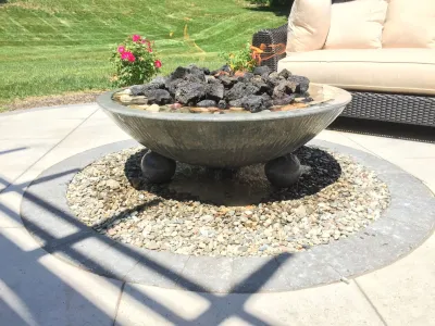 Paver patio with a pergola and fire/water feature. — Landscape Construction project by New Castle Lawn & Landscape