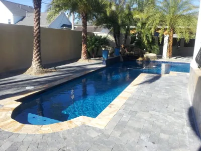 Custom Shaped Pools — Landscape Construction project by New Orleans Pool & Patio