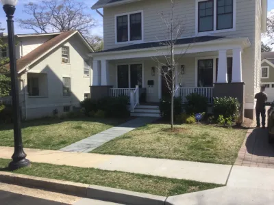 Upgraded walkway to stoop. Added stepping path to driveway. — Landscape Construction project by Northern Virginia Landscaping in Arlington