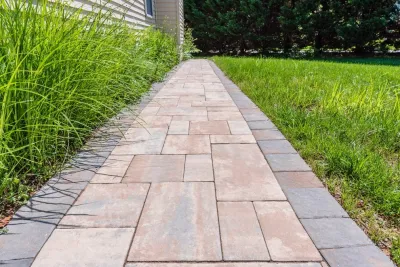 Outdoor fire-pit, seated walls, and large patio space for parties — Landscape Construction project by Northern Virginia Landscaping in Centreville