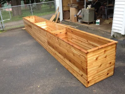 custom IPE wood planters by New York Plantings Garden Designers — Landscape Construction project by NY Plantings Irrigation And Landscape Lighting