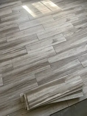 ceramic floor covering — Home Renovation & Remodeling Services project by Manzano's Development