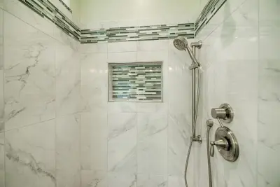 Shower and Tub Tile Surround — Home Renovation & Remodeling Services project by First Choice Home Remodeling