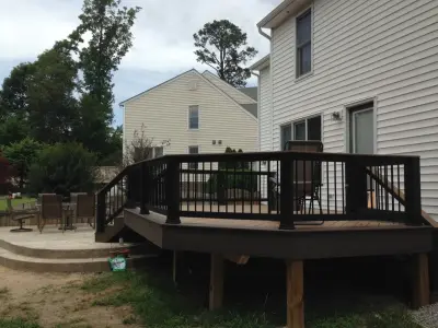 Timbertech Tigerwood Decking and Stamped Concrete Patio — Home Renovation & Remodeling Services project by Virginia Building And Remodeling