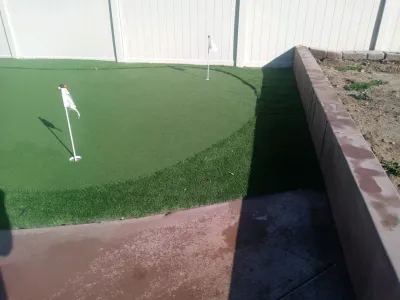 Fore!!! Beautiful Custom Putting Greens — Landscape Construction project by Oasis Turf & Hardscape in Riverside