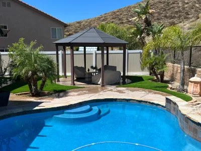 Pool Landscaping | Pool with Artificial Grass — Landscape Construction project by Oasis Turf & Hardscape in Riverside