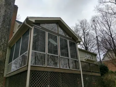 Classic year-round porch extension by Home Upgrades, LLC