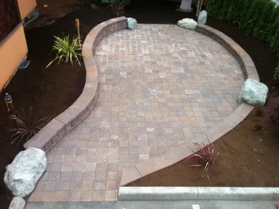 Contemporary Brick Patio — Landscape Construction project by Olympic Rockeries in Seattle