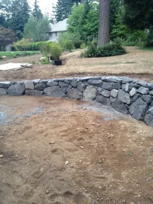 Natural Stone Retaining Walls — Landscape Construction project by Olympic Rockeries in Seattle
