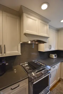 Naperville Glass-Accented Transitional White Kitchen — Home Renovation & Remodeling Services project by Adam Hartig