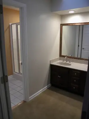 Travertine Restroom — Home Renovation & Remodeling Services project by Bailey Home Services LLC